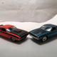 Illustration for article titled AutoWorld vs. Johnny Lightning:1970 Dodge Challengers (T/A vs R/T)